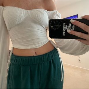 Puffy sleeve, off the shoulder Isabelle’s Cabinet long sleeve top